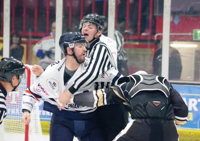 An altercation during the Phantoms v MK cup match at Planet Ice involving the city side's Tom Norton (left). Photo: Matt Sludds