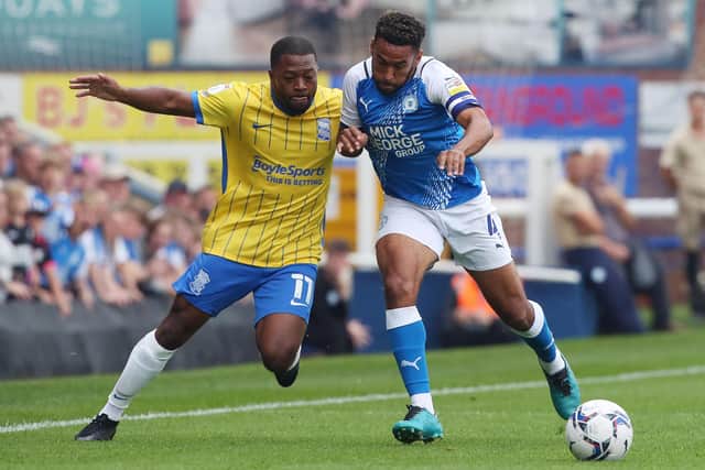 Nathan Thompson battles with Jeremie Bela. Photo: Joe Dent.