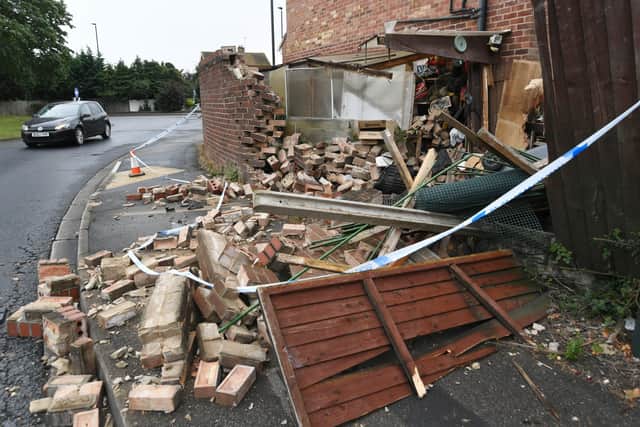 House hit by a car at Atherstone Avenue, Netherton EMN-210919-152607009