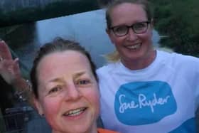 Amanda (pictured left) and her friend Sammie (right) participating in a Sunrise Walk in memory of their friend Katherine
