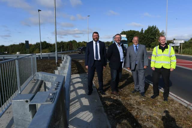 Cllr Chris Harper, Cllr Peter Hiller, Cllr Ray Bisby and Scott Blackburn from Peterborough Highway Services at the official opening of the new junction at Whittlesey Road/Pondersbridge Road near Stanground. EMN-210923-150420009