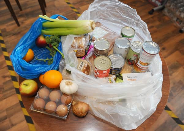 Many groups and individuals came together to help their communities in the pandemic, including delivering food parcels.