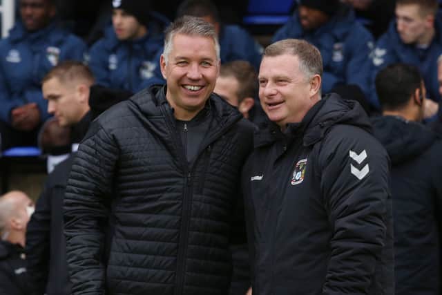 Peterborough United Manager Darren Ferguson and Coventry City manager Mark Robins before the match in 2019. Photo: Joe Dent/JMP.