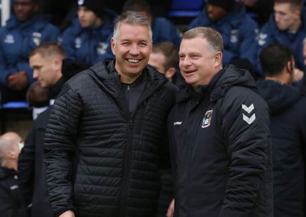Peterborough United Manager Darren Ferguson and Coventry City manager Mark Robins before the match in 2019. Photo: Joe Dent/JMP.