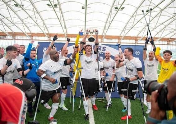Peterborough United Amputee team celebrate their FA Cup success. LAJ Photography.