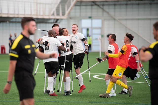 Peterborough United Amputee team celebrate their FA Cup success. LAJ Photography.