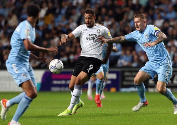 Jonson Clarke-Harris in action in the defeat at Coventry City last month. Photo: Joe Dent/theposh.com.