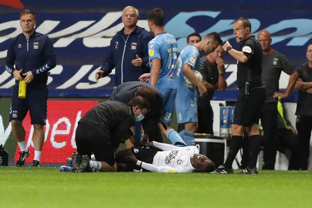 Dembele had to leave the field injured against Coventry. Photo: Joe Dent.