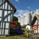 Banksy's work on one of the model houses in the Merrivale Model Village. The artist has confirmed he was behind various pieces of street art which appeared in Suffolk and Norfolk.