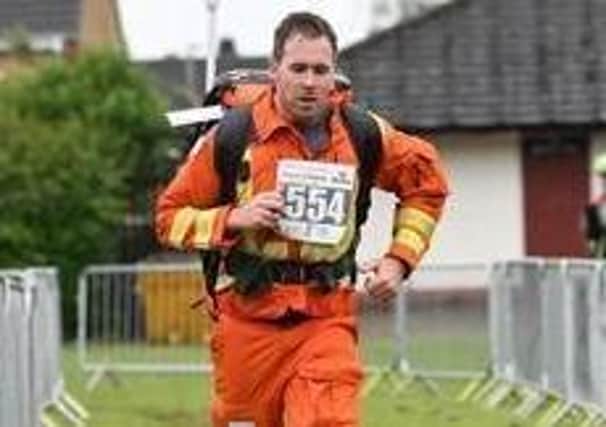 Magpas Air Ambulance Dr Scott takes on gruelling running challenge in full kit