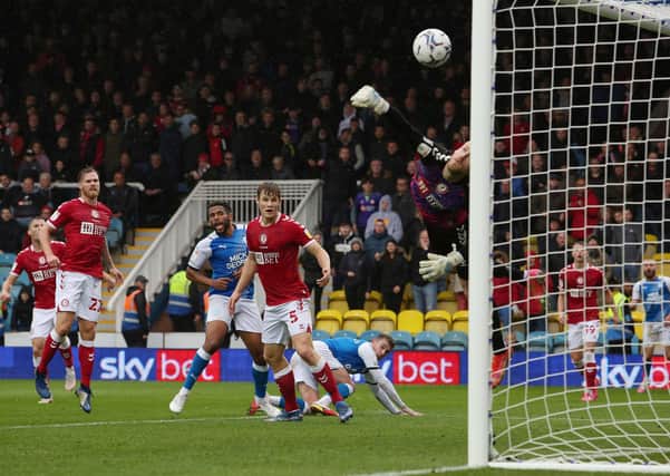 Sammie Szmodics of Peterborough United scores his sides second goal of the game against Bristol City. Photo: Joe Dent/theposh.com.
