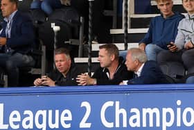 Posh chairman Darragh MacAnthony (centre) with manager Darren Ferguson (left) and director of football Barry Fry.