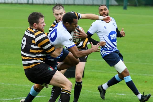 Try scorer Roko Davui (white) in action for Peterborough Lions at Oadby. Photo: Mick Sutterby.