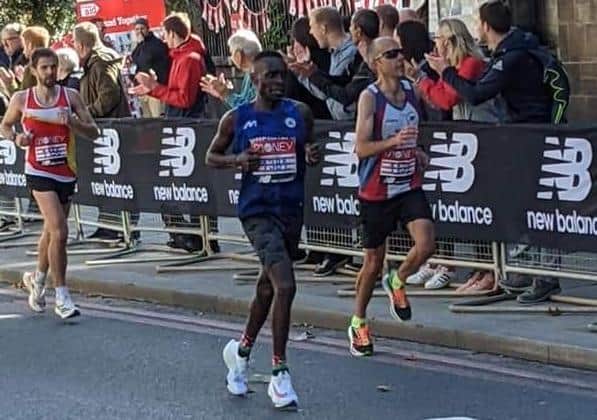 Martin Gichuhi (blue shirt) didn't let a noisy hotel spoil his London Marathon run.