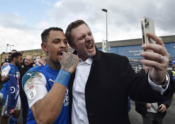 Darragh MacAnthony and Jonson Clarke-Harris celebrate promotion from League One together last season.