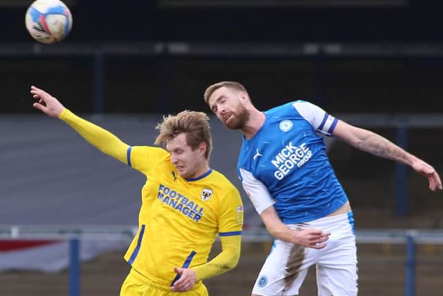 Mark Beevers (right) in action for Posh.