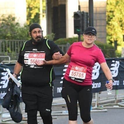Del and Laura running in the marathon