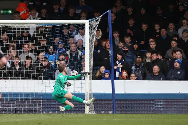 Posh goalkeeper Will Norris can't keep out Alfie May's long-range strike from close to halfway. Photo: Joe Dent/theposh.com.