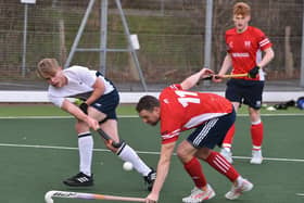 Gareth Andrew (red) in action for City of Peterborough against Birmingham University. Photo: David Lowndes.