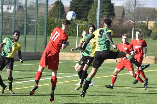 Action from the 2-2 draw in Peterborough League Division Two between Peterborough Rangers and Whaplode Drove (red). Photo: David Lowndes.