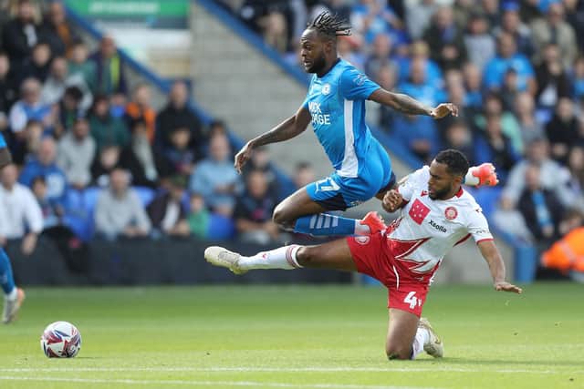 Posh striker Ricky-Jade Jones in action with Nathan Thompson of Stevenage. Photo Joe Dent./theposh.com