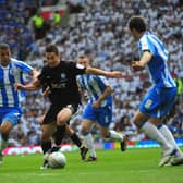 Tommy Rowe in action for Posh against Huddersfield Town in a 3-0 League One Play-off Final win at Old Trafford in 2011. Photo: Alan Storer.