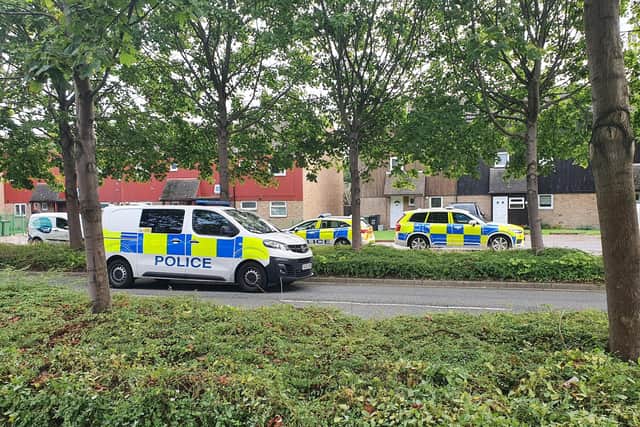 Police on the scene at Blackmead, Orton Malborne.
