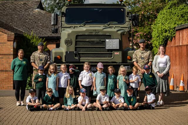 Members or RAF Wittering stem team along with the RAF police and 2MT visit Coates Primary School