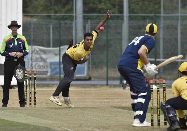 Sulemain Saleem bowling for Peterborough Town against Finedon. Photo: David Lowndes.