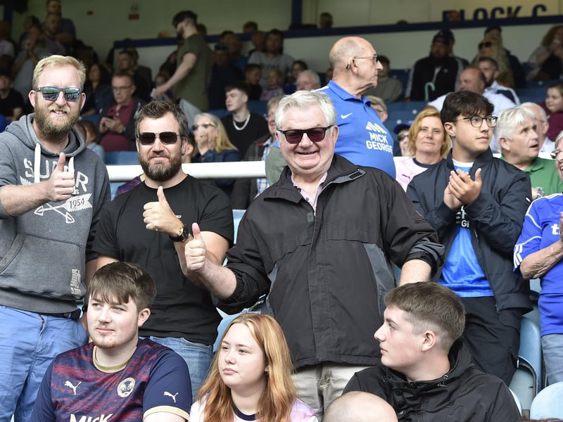 Peterborough United fans watch their side's defeat to Derby County.