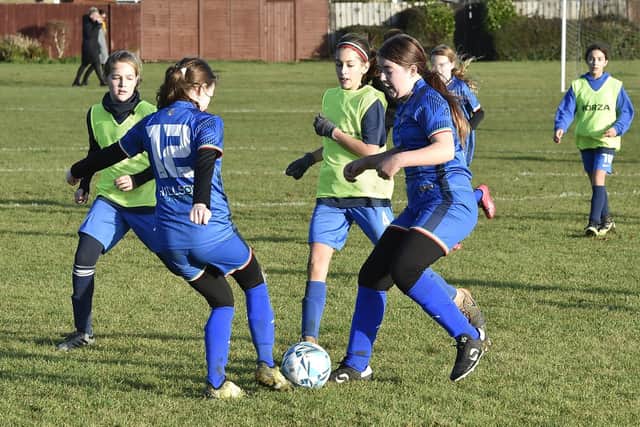 Action from ICA Sports Girls U12s (blue) 0, Chesterton 4. Photo: David Lowndes.