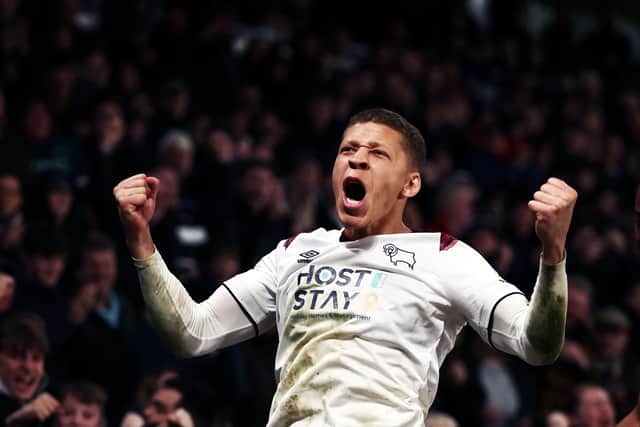 Dwight Gayle celebrates a Derby goal. Photo by Naomi Baker/Getty Images.