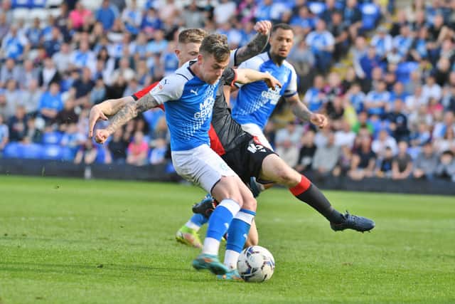 Sammie Szmodics scoring for Posh against Blackburn Rovers last season. Photo: David Lowndes.