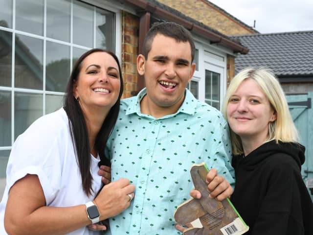 Liza Raby and her son Spencer Raby at home in Bourne with Home from Home Carer Stacie Lee (right)