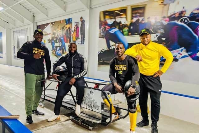 Ashley Watson (right) with the Jamaican bobsleigh team. Photo Getty Images.