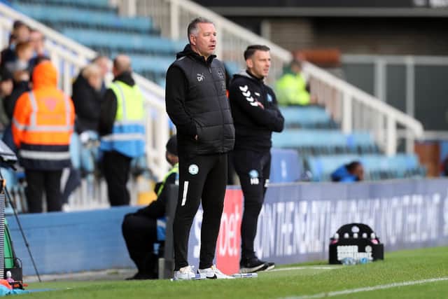 Posh boss Darren Ferguson alongside Wycombe manager Matt Bloomfield at London Road last season. Photo Joe Dent/theposh.com.