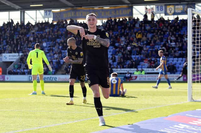 Jack Taylor does his special celebration after scoring for Posh against Shrewsbury. Photo: Joe Dent.