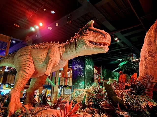 Volcano Falls Adventure Golf features moving dinosaurs
