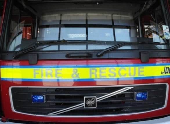 Crews had to cut one person out of their car following the collision