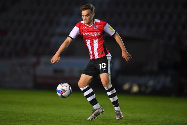 Archie Collins in action for Exeter City (Photo by Harry Trump/Getty Images).