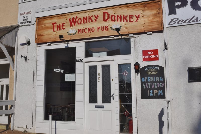 The Wonky Donkey, Fletton High Street: " It usually offers five beers, many straight from the cask, mostly LocAles, and also stocks a large range of ciders, wines and gins, along with several quality bottled lagers."