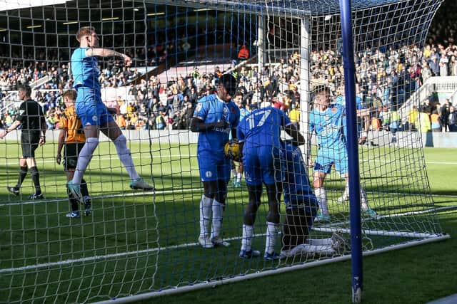 Posh celebrate a goal against Cambridge United last season. Photo Joe Dent/theposh.com