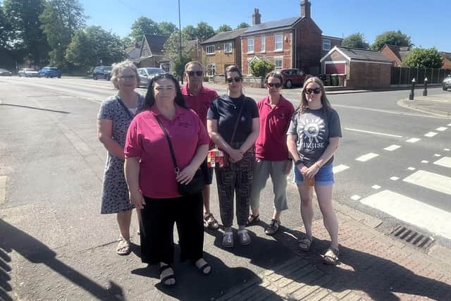 Concerned parents at the only zebra crossing near Werrington Primary School