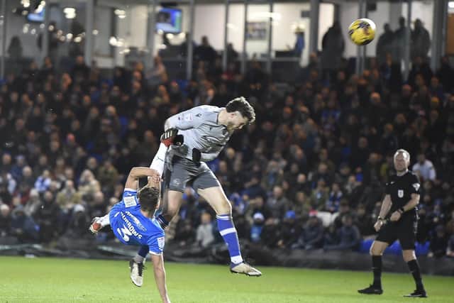 An acrobatic effort on goal from Posh full-back Harrison Burrows. Photo: David Lowndes.