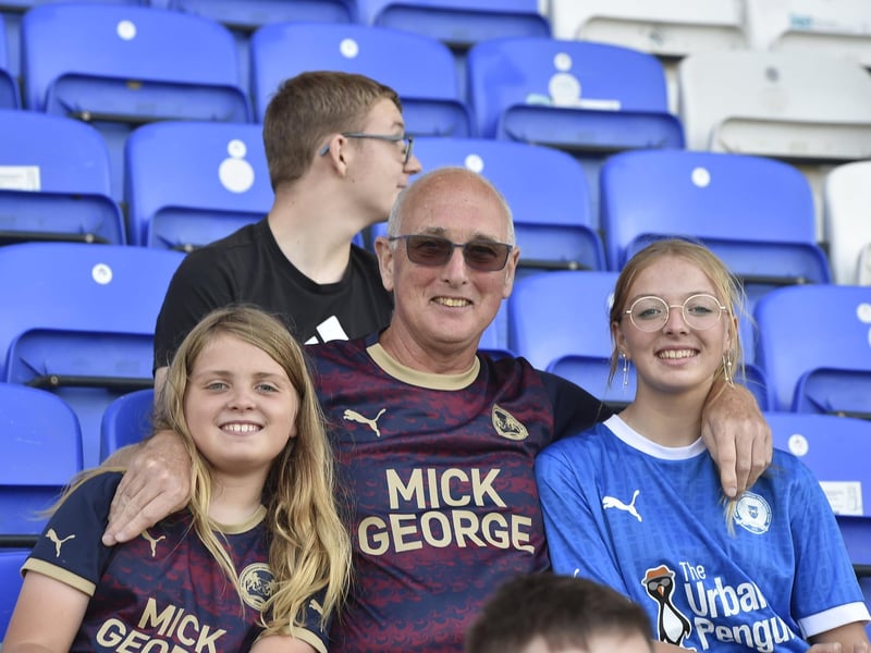 Peterborough United fans watch the draw with Leyton Orient.