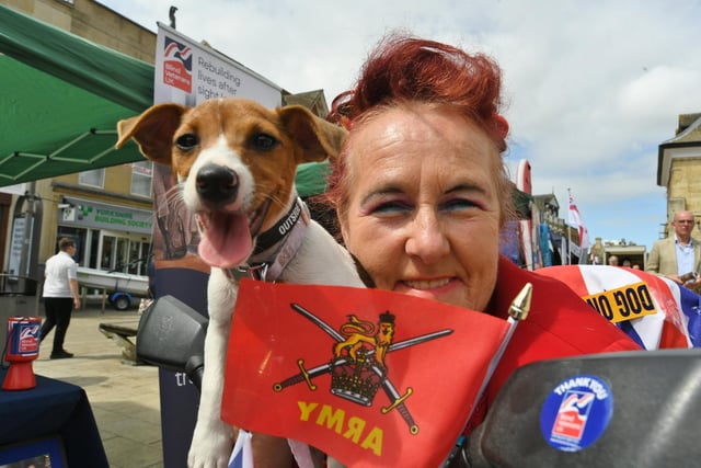 Teresa O'Rourke with her puppy Tara during the Armed Forces Day celebrations in Cathedral Square, Peterborough