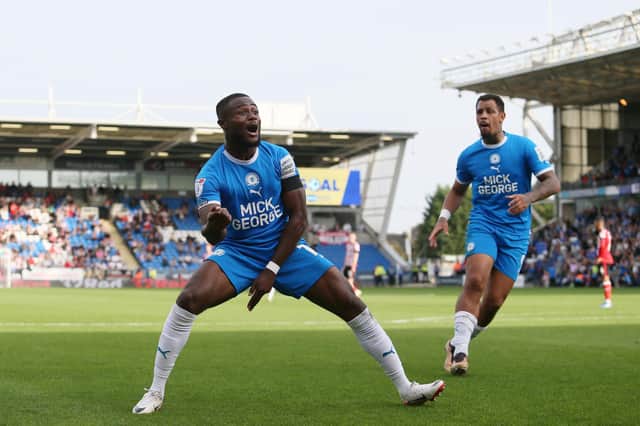 David Ajiboye of Peterborough United celebrates scoring the opening goal against Lincoln. Photo: Joe Dent.