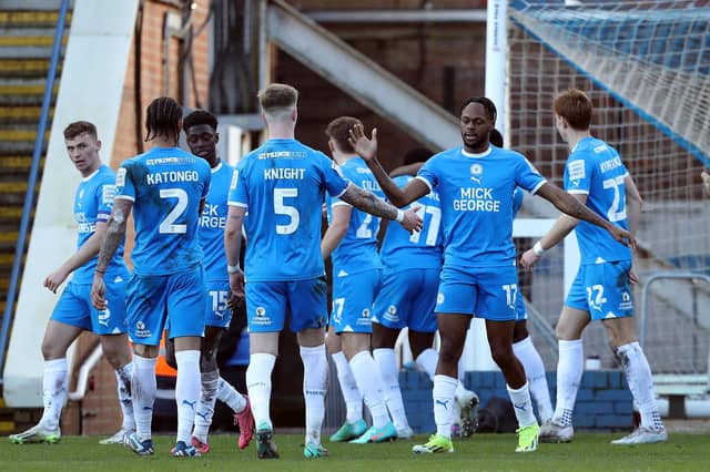 Posh players celebrate their winning goal in Saturday's 2-1 win over Exeter City. Photo: Joe Dent/theposh.com.