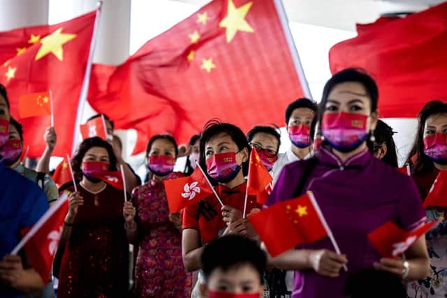 July 1, 2022; 25th anniversary of Hong Kong's handover from Britain to China. President Xi Jinping used the occasion to hail China's rule over Hong Kong, insisting democracy is flourishing despite a years-long political crackdown that has silenced dissent. (Photo by ISAAC LAWRENCE/AFP via Getty Images)