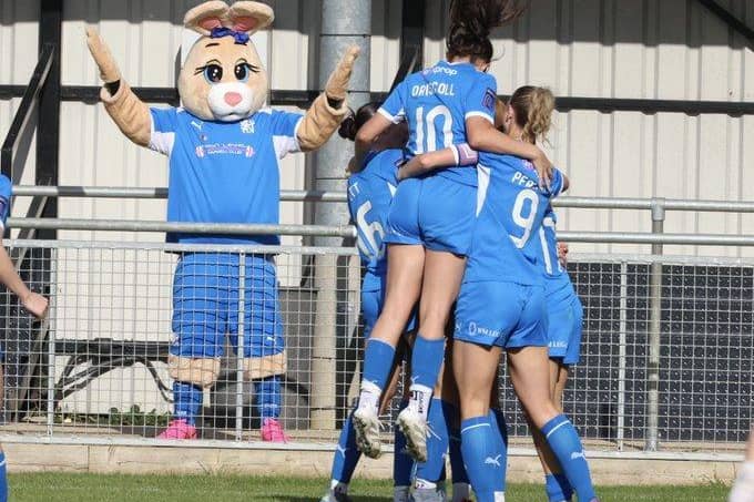 Posh Women celebrate a goal against Huddersfield. Photo Darren Wiles.